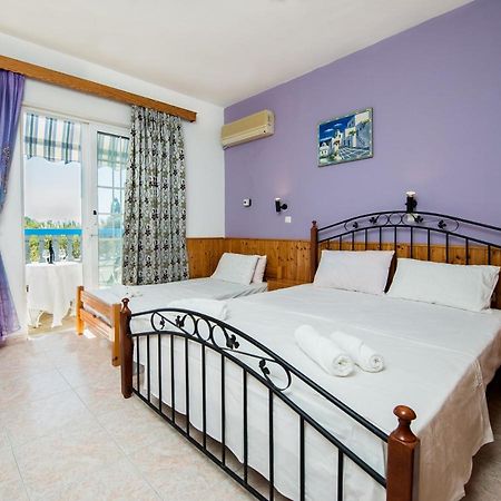Poseidon Apartment อาร์คานเยโลส ภายนอก รูปภาพ