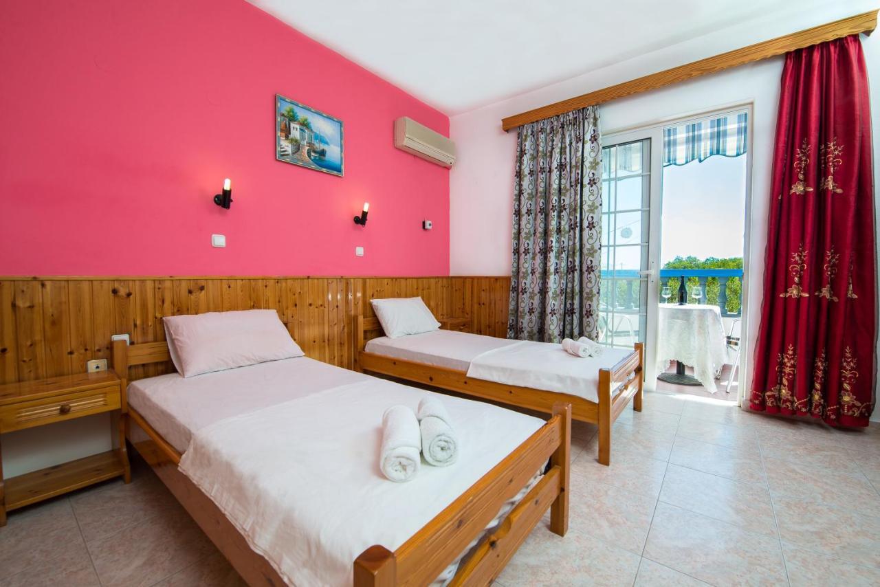 Poseidon Apartment อาร์คานเยโลส ภายนอก รูปภาพ