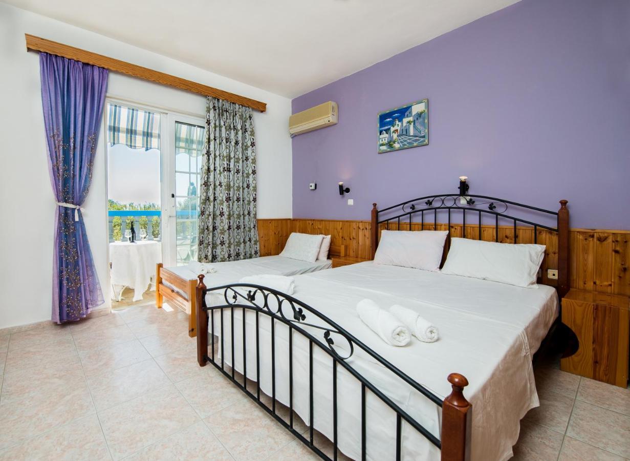 Poseidon Apartment อาร์คานเยโลส ภายนอก รูปภาพ